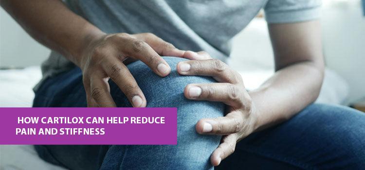 Person holding knee in pain, promoting Cartilox supplement for joint relief from Phlox.
