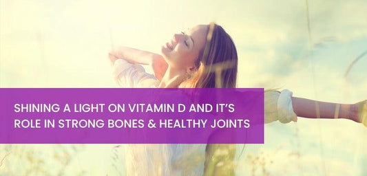 Woman enjoying sunlight in a field, promoting vitamin D for strong bones and healthy joints